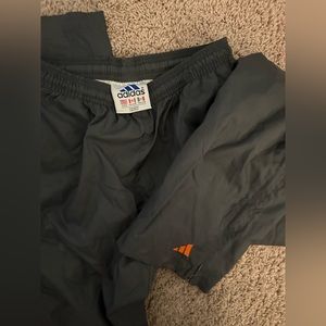 Grey adidas wind breaker pants! Great for soccer and have zippers on the side.